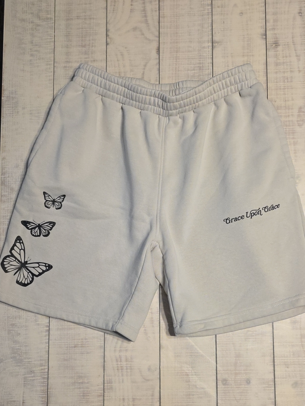 Elevated Faith Shorts With Message Grace Upon Grace & Butterflies Print In Black